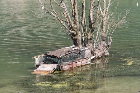 old boat on lakeの写真素材