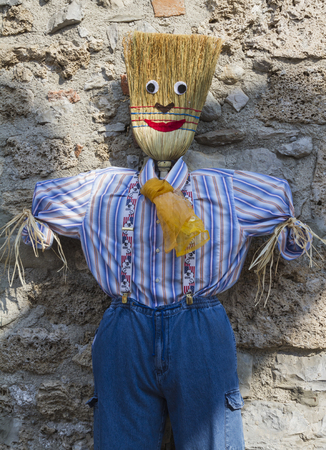 Stuffed manÂ  with broomの写真素材