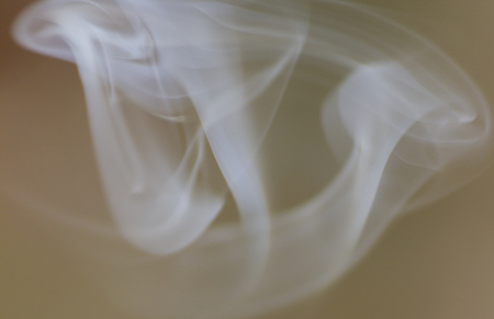 lit incense smokingの写真素材