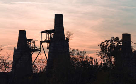 old furnace at sunsetの写真素材