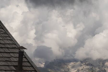 rocky mountain and cloudy sky