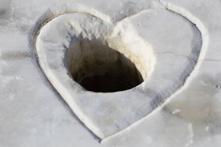 heart carved in marbleの写真素材