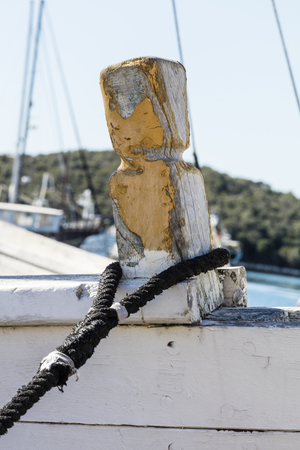 old boat docked at the portの写真素材