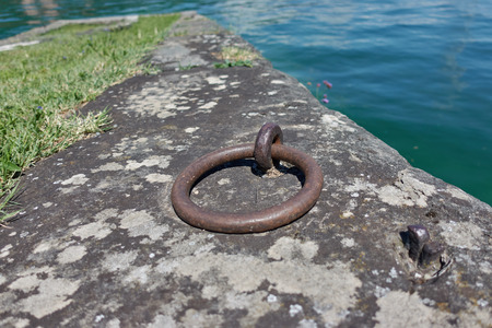mooring ring at the harborの写真素材
