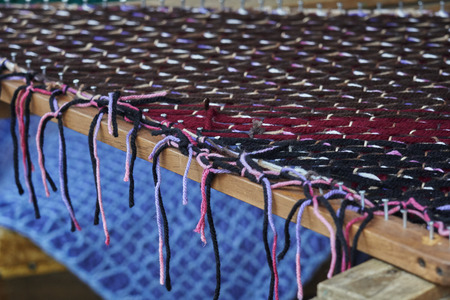weaving on an old loom