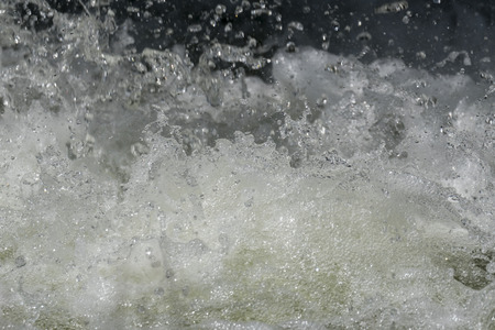 water splashes from the waterfall