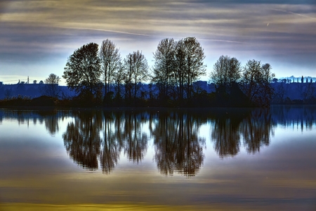 winter reflection on landscape lakeの写真素材