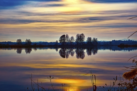 winter reflection on landscape lakeの写真素材