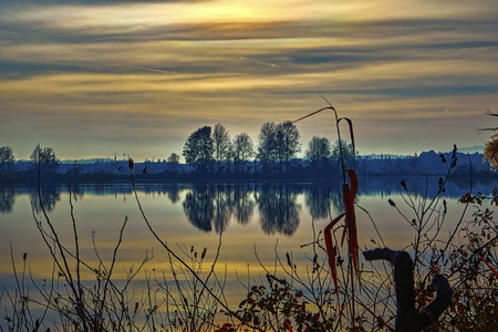 winter reflection on landscape lakeの写真素材