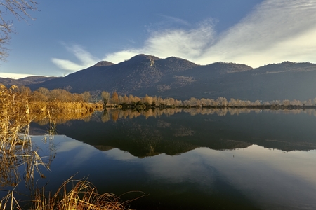 winter reflection on landscape lakeの写真素材