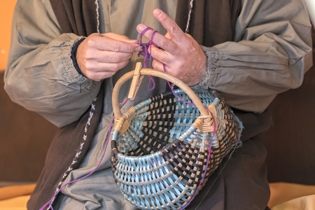 man working with woolの写真素材