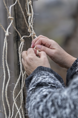 woman weaving networksの写真素材