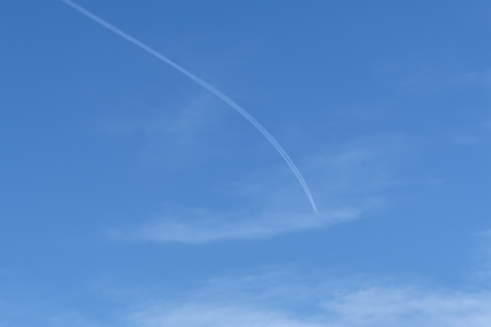 aerial trail wake in the skyの写真素材