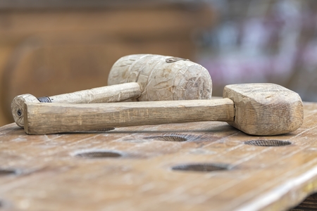old wooden hammer in the factoryの写真素材