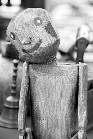 old wooden puppet at garage saleの写真素材