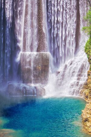 scenic waterfalls in the mountainの写真素材