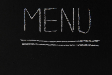 Menu title written with chalk on blackboard.