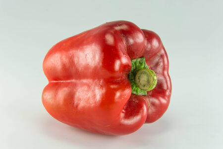 Fresh colorful sweet bell peppers  ( capsicum ) on a white background.の写真素材