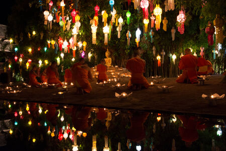 CHIANG MAI THAILAND-NOVEMBER 7 : Loy Krathong festival in Chiangmai.Tradition al monk lights floating balloon made of paper annually at Wat Phan Tao temple.On November 7,2014 in Chiangmai,Thailand.のeditorial素材