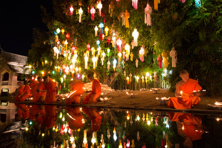 CHIANG MAI THAILAND-NOVEMBER 7 : Loy Krathong festival in Chiangmai.Tradition al monk lights floating balloon made of paper annually at Wat Phan Tao temple.On November 7,2014 in Chiangmai,Thailand.のeditorial素材
