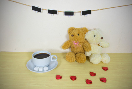 Still life with clothesline on wooden table over grunge background, Valentine conceptの写真素材