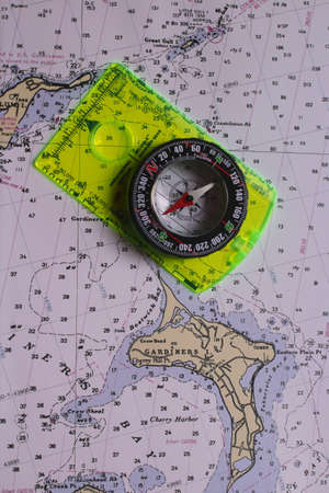 Nautical map with an orienteering compass