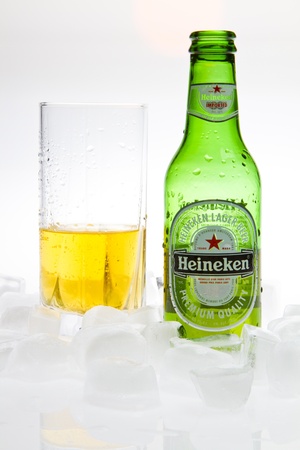 Heineken beer with glass and ice isolated studio shotのeditorial素材