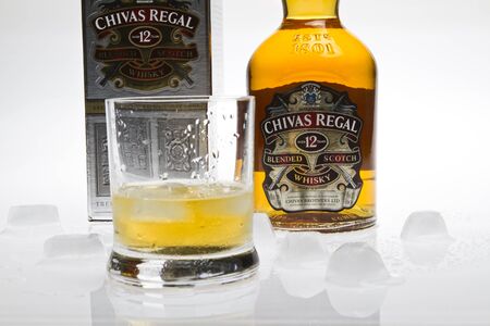 Chivas Regal Whisky isolated with glass and iceのeditorial素材