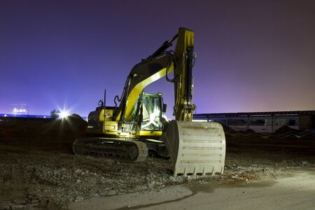 Excavator at night long exposure shotの写真素材