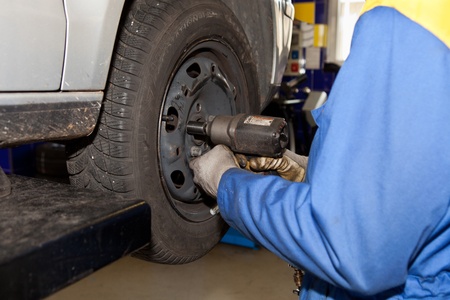 Tire change At the machanic shopのeditorial素材