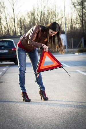 Woman with broken car seeking help