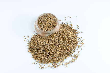 Hemp seeds held by woman hands, shaping a heartの写真素材