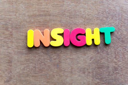 insight word in wood backgroundの写真素材