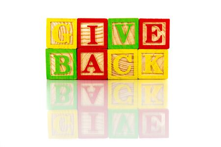 give back words reflection on white backgroundの写真素材