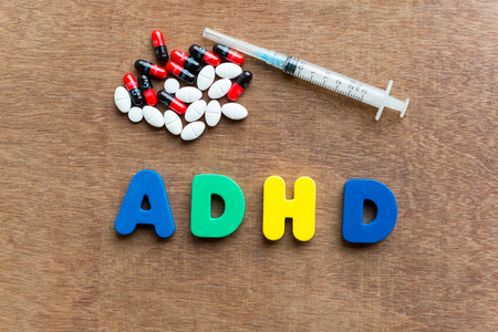 adhd colorful word in the wooden backgroundの写真素材