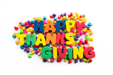 happy thanksgiving colorful word on the white backgroundの写真素材
