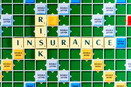 risk Crossword on the colorful game boardの写真素材