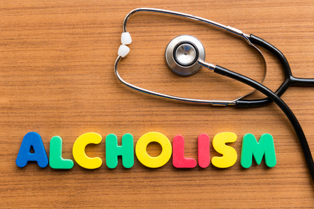 alcholism colorful word on the wooden backgroundの写真素材