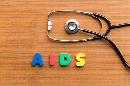 aids colorful word on the wooden backgroundの写真素材
