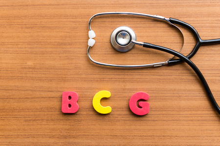 bcg colorful word on the wooden backgroundの写真素材