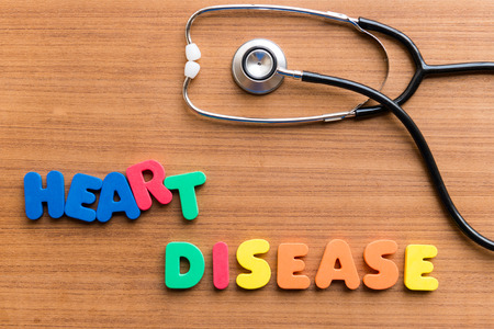 heart disease colorful word on the wooden backgroundの写真素材