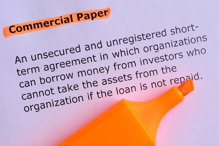 commercial paper word highlighted on the white paperの写真素材