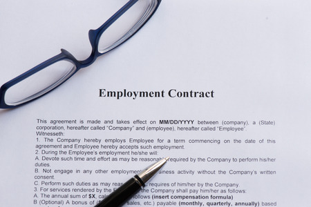 employment contract  on the white paper with pen