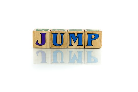 jump colorful wooden word block on the white backgroundの写真素材