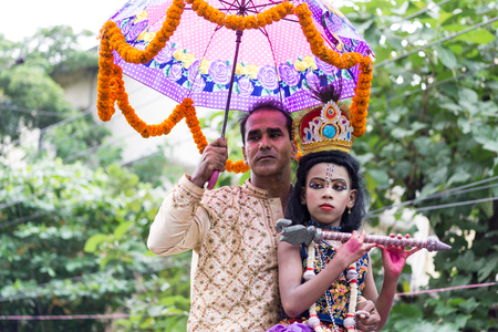 Dhaka, Bangladesh - September 04, 2015: A child dressed as Lord Krishna on the occasion of Janmashtami in Dhakeshwari Mandir, Dhaka, Bangladeshのeditorial素材