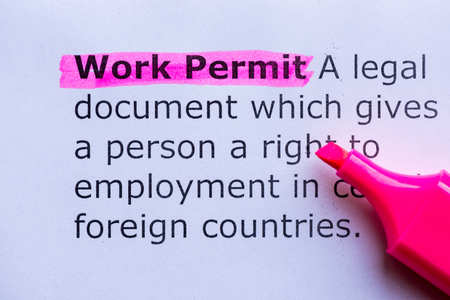work permit  word highlighted on the white backgroundの写真素材
