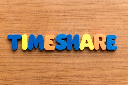 Timeshare colorful word on the wooden backgroundの写真素材