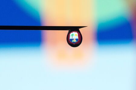 West Indies flag through water dropの写真素材