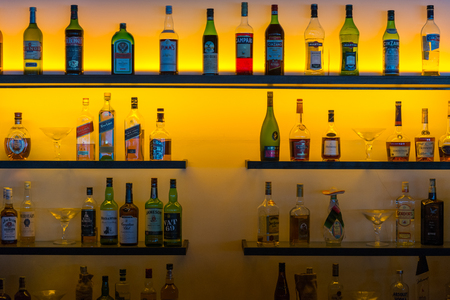 Various liquor and wine bottles backlitのeditorial素材
