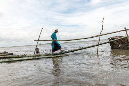 Dohar, Bangladesh - August 5, 2016: Heavy flooding from monsoon rain and tide from river in Dohar, Bangladesh on August 5, 2016のeditorial素材